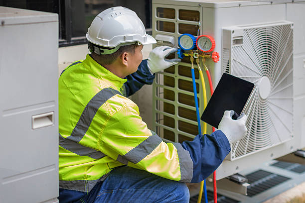 Professional Air Conditioning Repair technician working in Summerland, CA